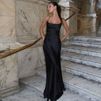 Chic Black Suspender Dress With Tied Waist Charm And Elegance