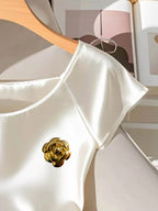 White Satin Shirt With Gold Flower Brooch Detail And Ruched Side Drawstring Blouse