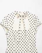 Polka Dot Cutout Bow Front Mini Dress