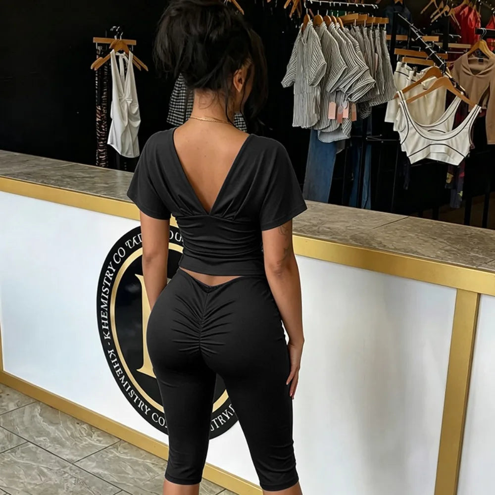Two Piece Solid Color Set With Deep V Neck Ruched Crop Top And Capri Pants