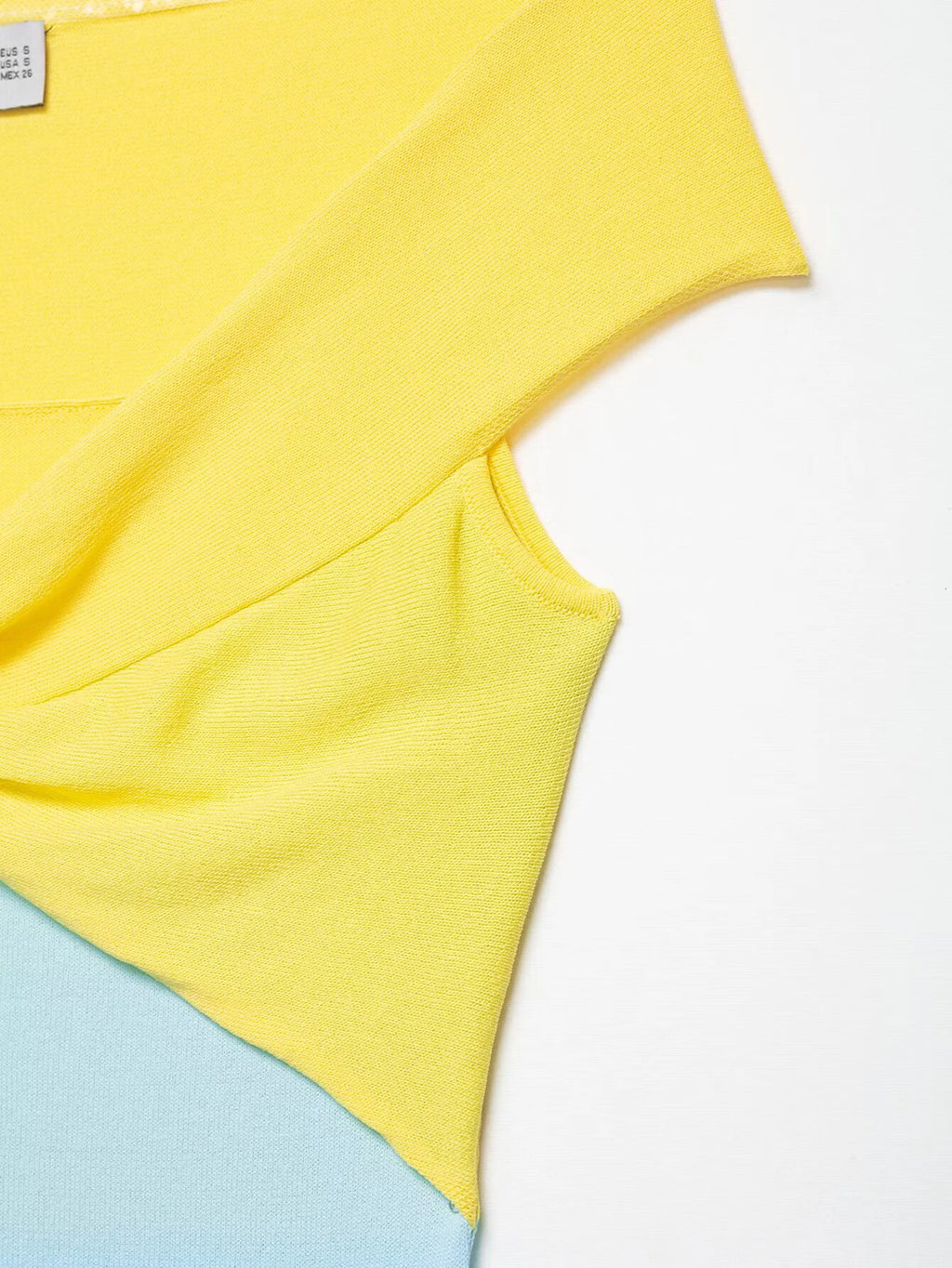 Breeze Knit Top With Knot Detail For A Silky Slim Fit