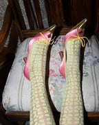 Retro Pink Satin Pointed Toe Pumps With Gold Toe Cap And Yellow Bow Accent Playful Low Heel