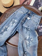 Vintage Embroidered Denim Jeans With High Waist Slim Fit And Beaded Details