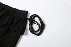 Irregular Tiered Flare Pants With Patchwork See Through