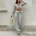 Breezy Ruffle Set With Lightweight Top And Flowing Trousers Casual Style