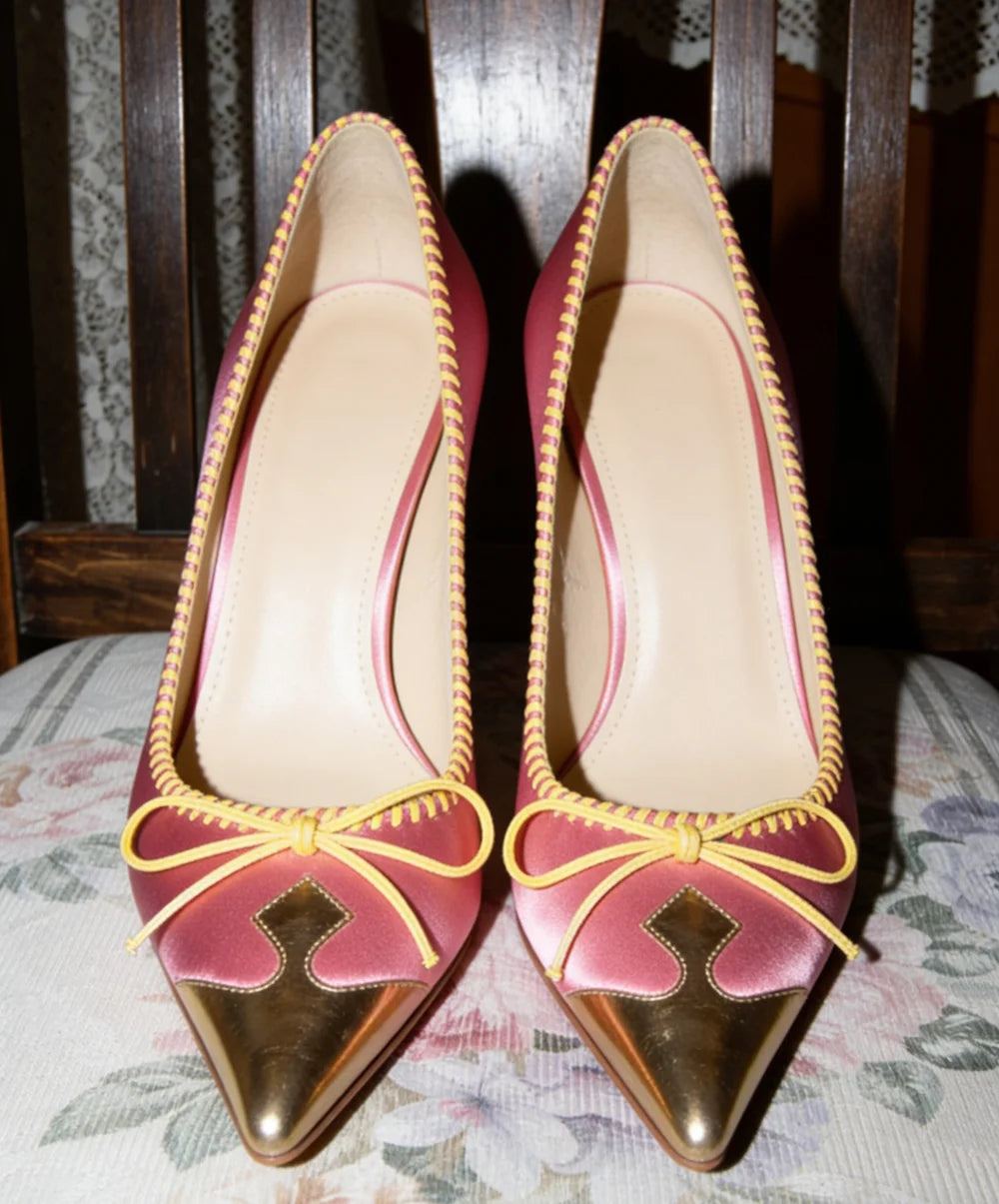 Retro Pink Satin Pointed Toe Pumps With Gold Toe Cap And Yellow Bow Accent Playful Low Heel