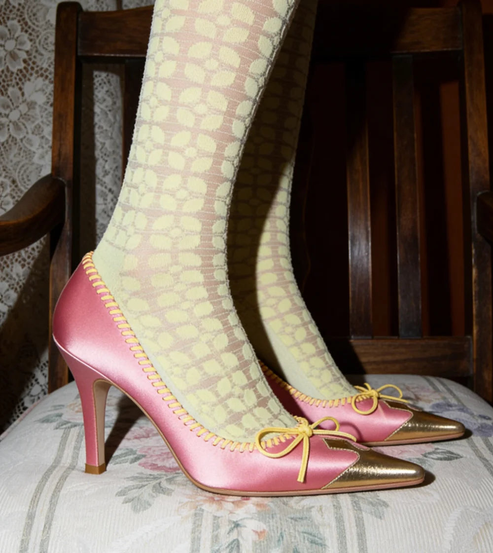 Retro Pink Satin Pointed Toe Pumps With Gold Toe Cap And Yellow Bow Accent Playful Low Heel