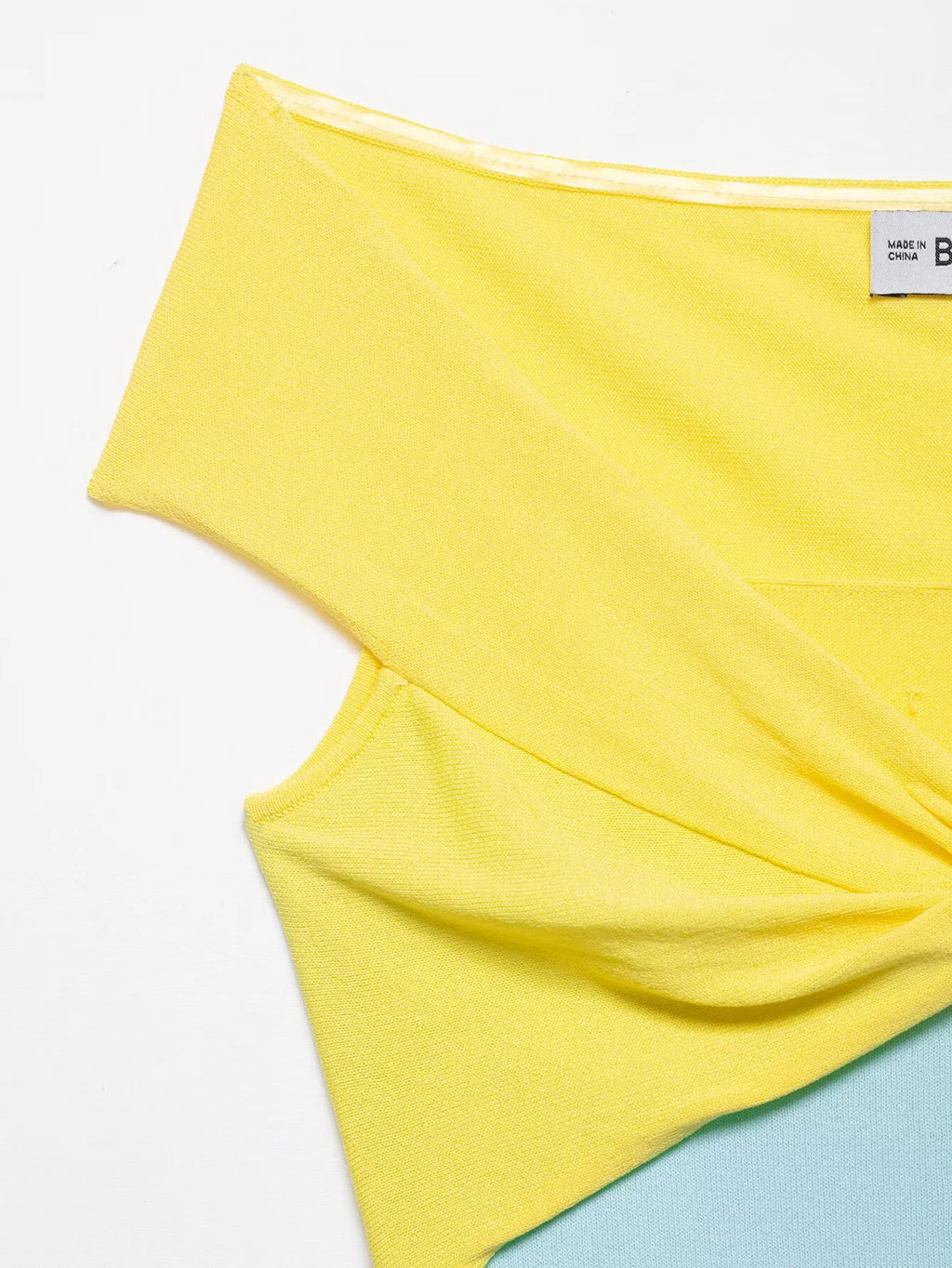 Breeze Knit Top With Knot Detail For A Silky Slim Fit