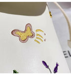 Whisper Bloom Embroidered Floral Bucket Bag With Textured Surface For Everyday Chic And Elegant Casual Carry
