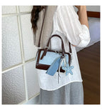 Denim Crossbody Bag With Embroidered Ruched Detailing And Subtle Rivet Accents