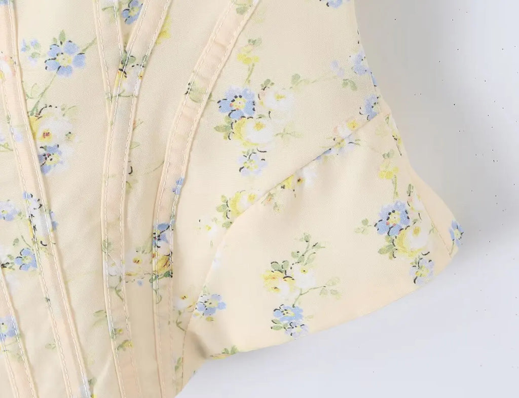 Sunlit Yellow Floral Corset Top With Lace Trim And Delicate Spaghetti Straps