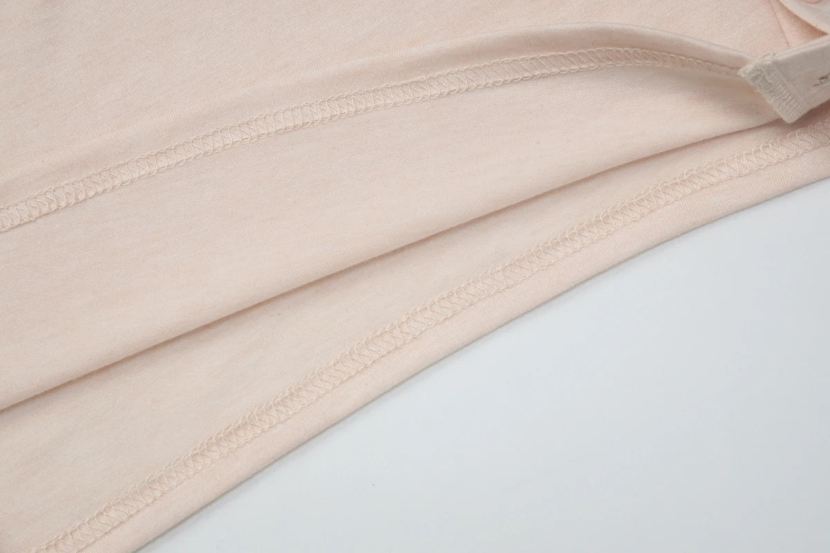 Turtleneck Crop Tank With Slit And Button Details