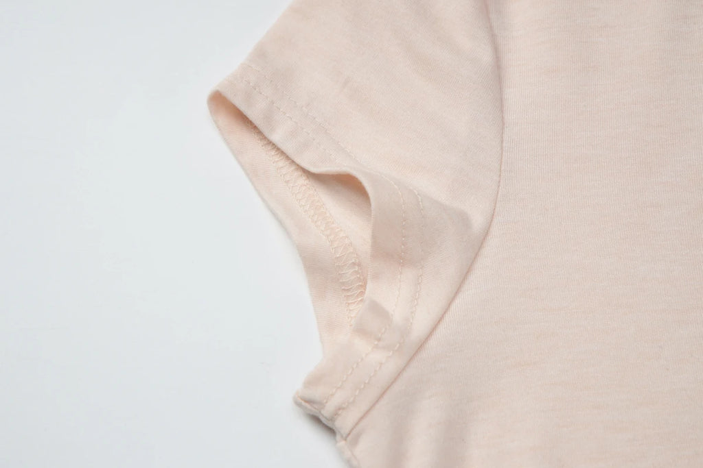 Turtleneck Crop Tank With Slit And Button Details