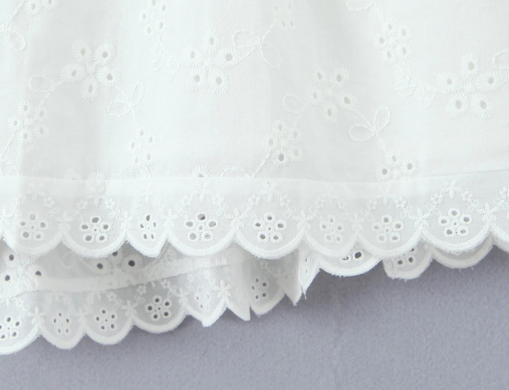 White Embroidered Lace V Neck Mini Dress With Hollow Out Detail And Back Zipper Closure