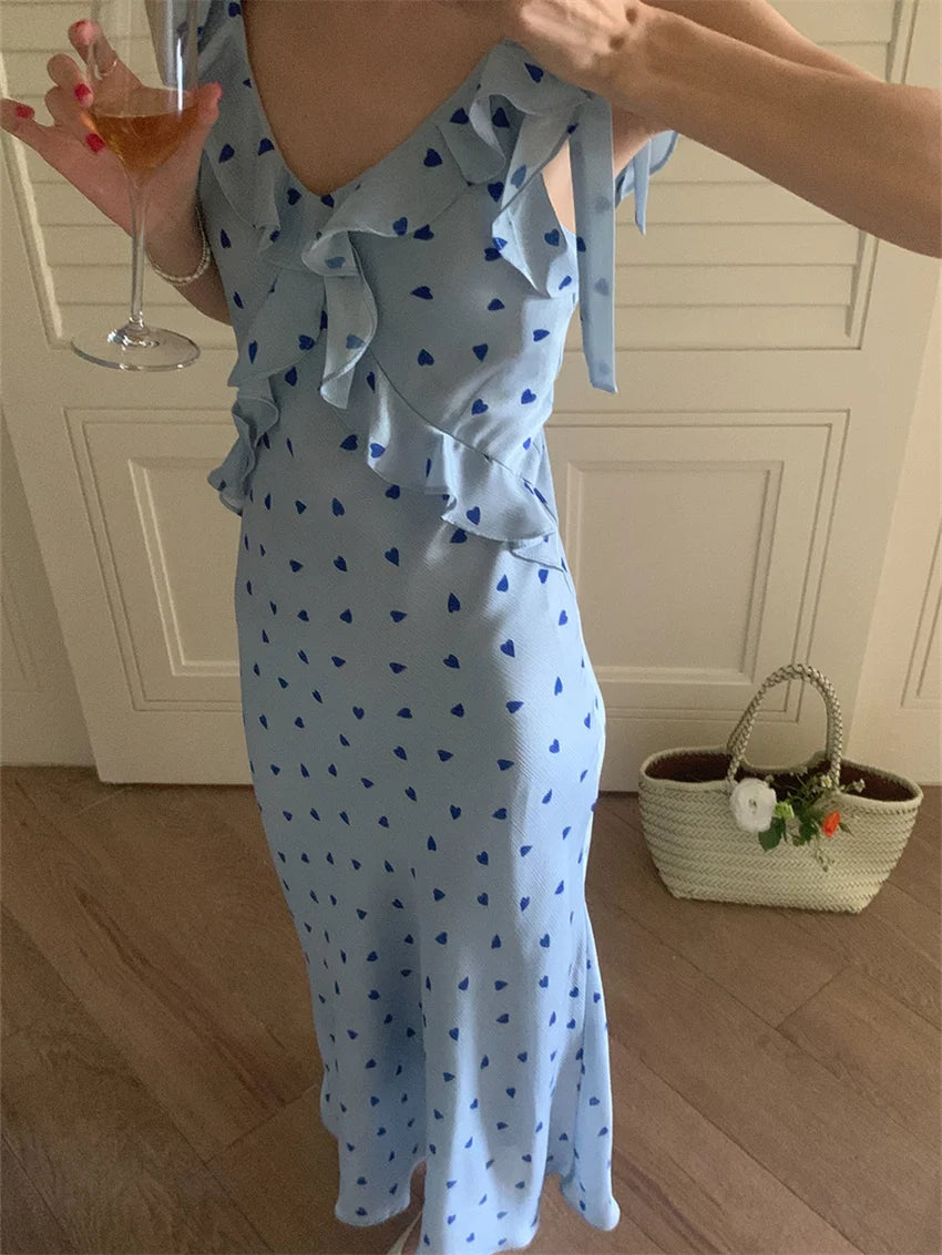 Allover Printed Dress With V Neckline Ruffles And Sleeveless Silhouette