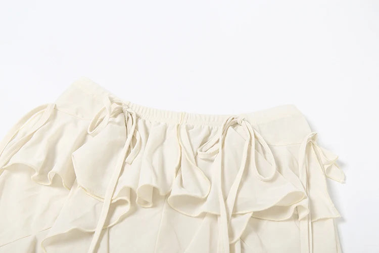 Irregular Tiered Flare Pants With Patchwork See Through