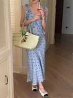 Allover Printed Dress With V Neckline Ruffles And Sleeveless Silhouette