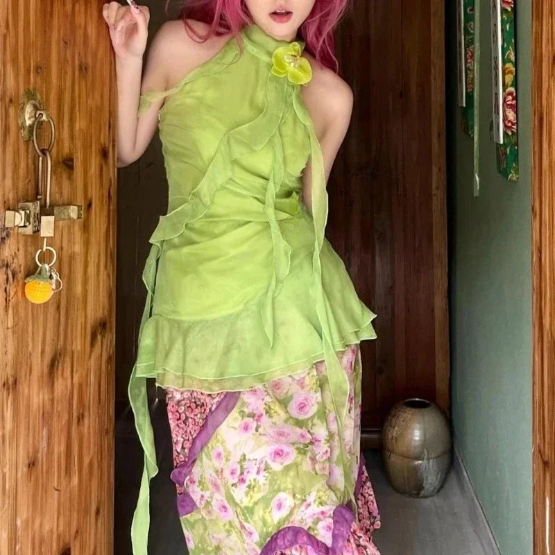 Green Ribbon Chiffon Sleeveless Top With Open Back And Floral Accent