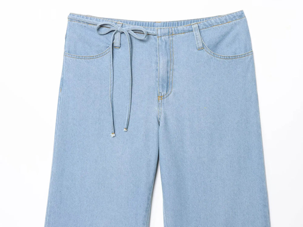 Two-piece Set For Women With Backless Top And Casual Cowboy Pants Ensemble