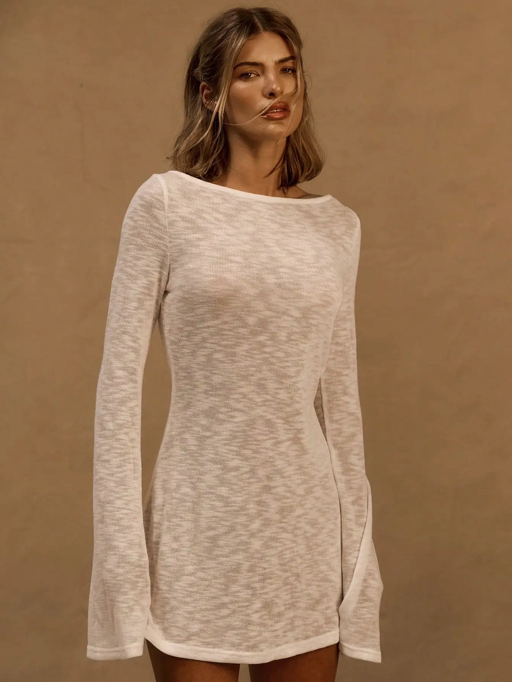 A Line Knit Mini Dress With Slash Neck And Bell Sleeves
