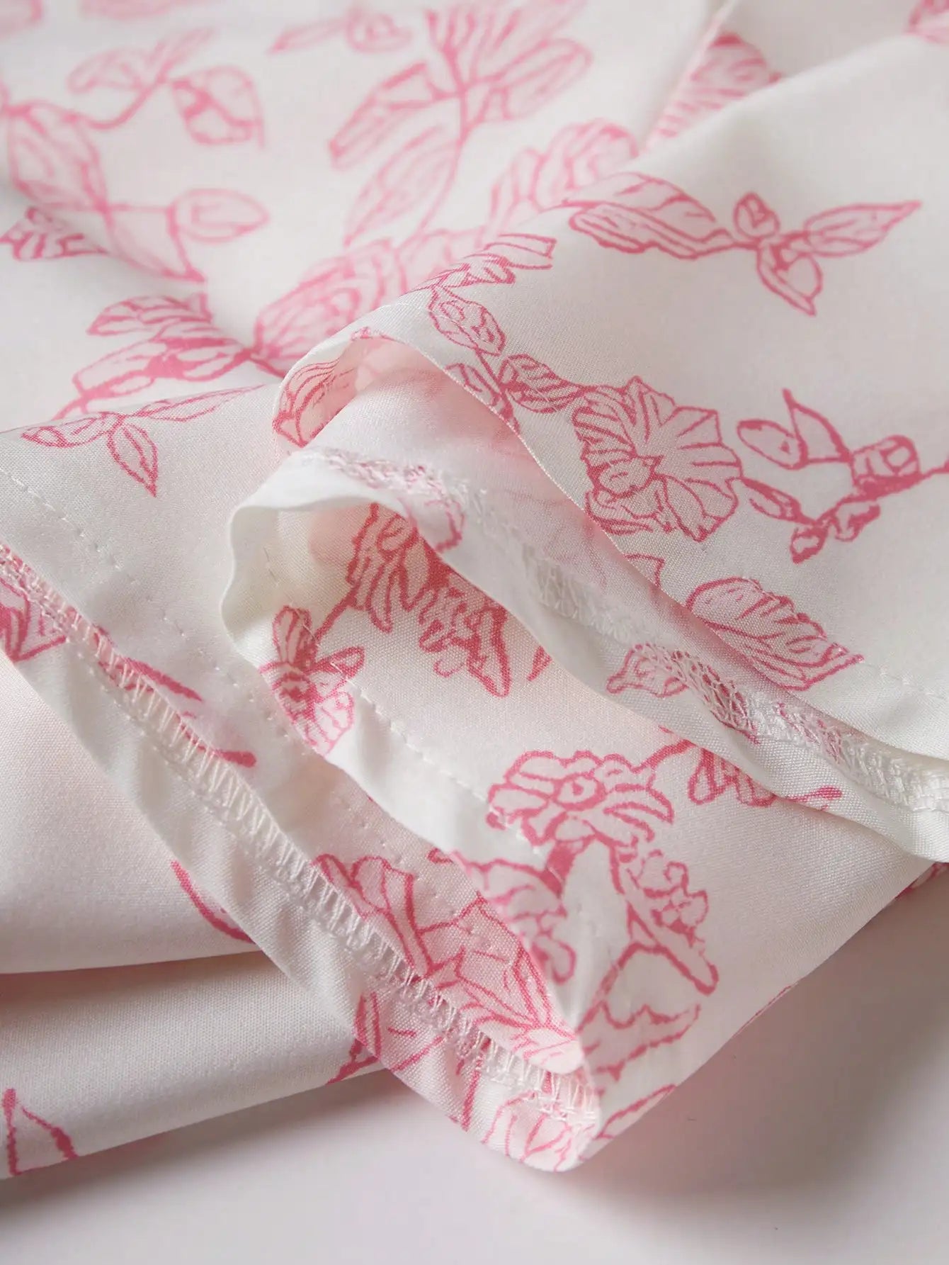 Blush Pink Floral Dress With Thin Straps And Flared Waist