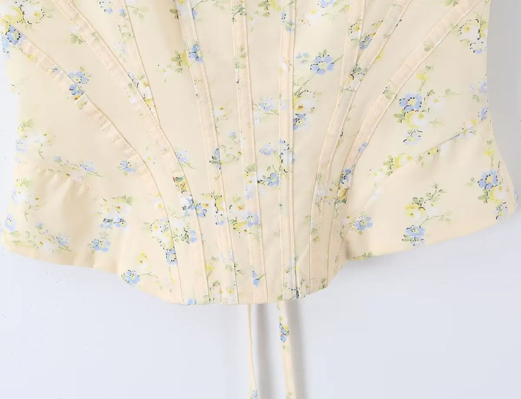 Sunlit Yellow Floral Corset Top With Lace Trim And Delicate Spaghetti Straps