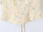 Sunlit Yellow Floral Corset Top With Lace Trim And Delicate Spaghetti Straps