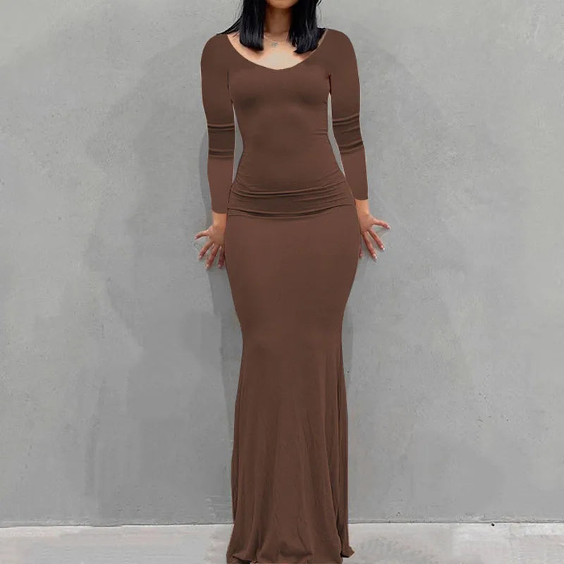Long Sleeve Dress With Slim Silhouette And Flowing Maxi Skirt