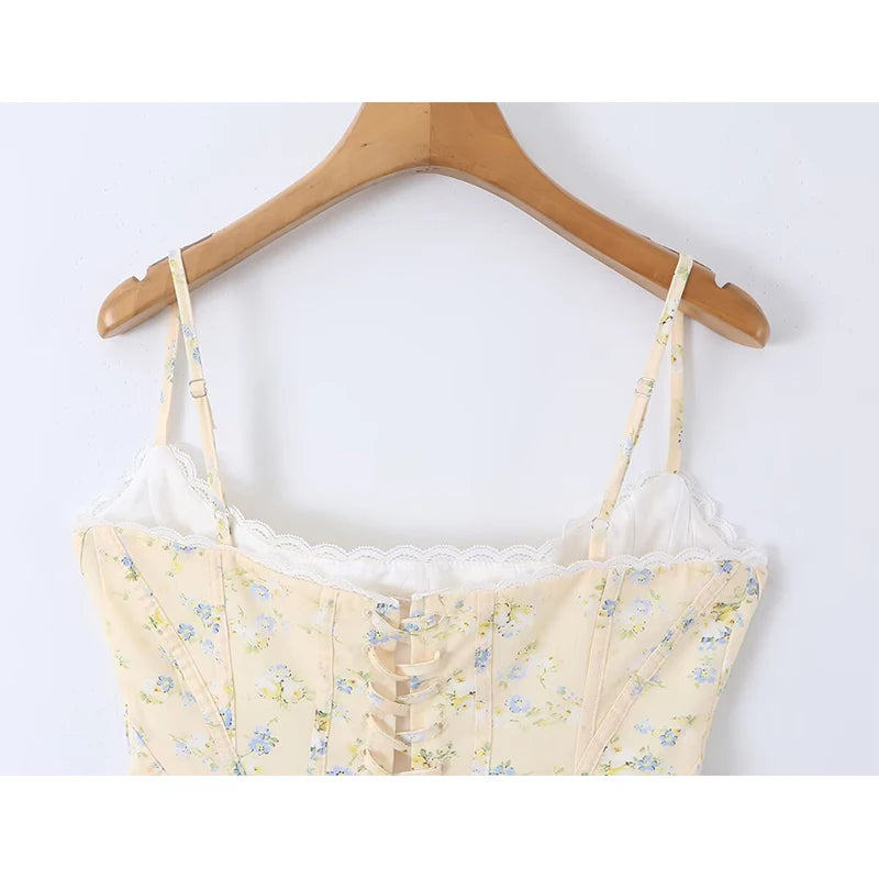 Sunlit Yellow Floral Corset Top With Lace Trim And Delicate Spaghetti Straps