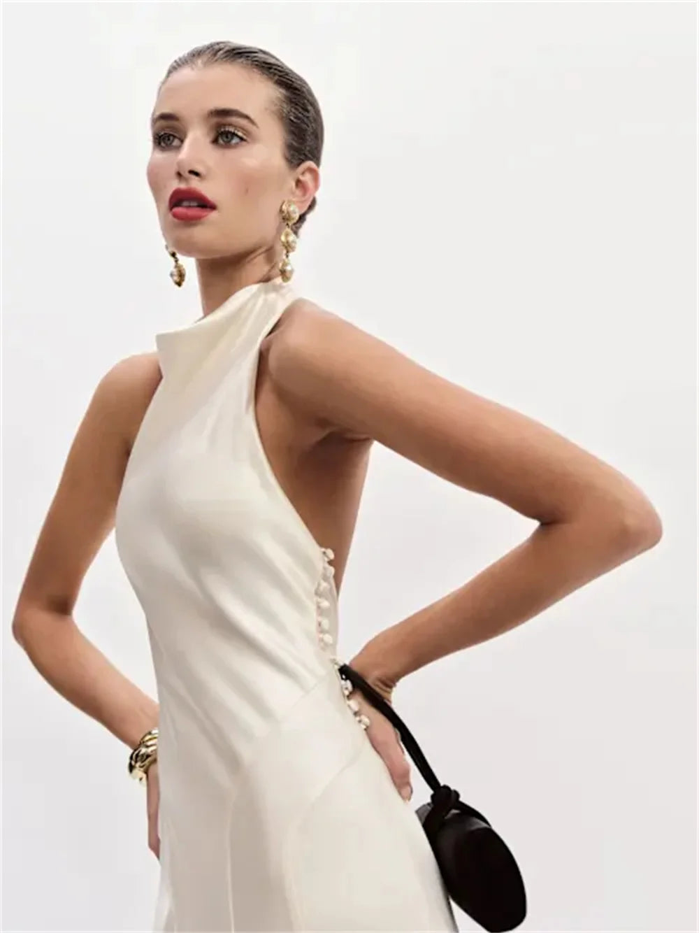 White Satin Halter Neck Gown With Backless Design Floor Length Dress