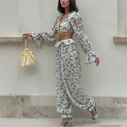 Breezy Ruffle Set With Lightweight Top And Flowing Trousers Casual Style