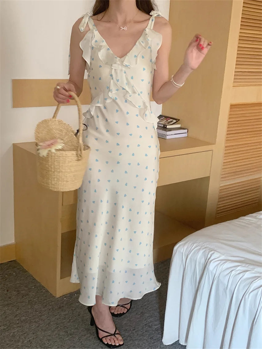 Allover Printed Dress With V Neckline Ruffles And Sleeveless Silhouette