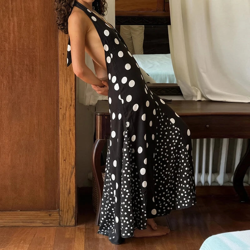 Bohemian Backless Halter Dress With Floral Print And Hollow Detailing