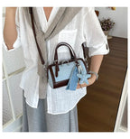 Denim Crossbody Bag With Embroidered Ruched Detailing And Subtle Rivet Accents