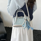 Denim Crossbody Bag With Embroidered Ruched Detailing And Subtle Rivet Accents