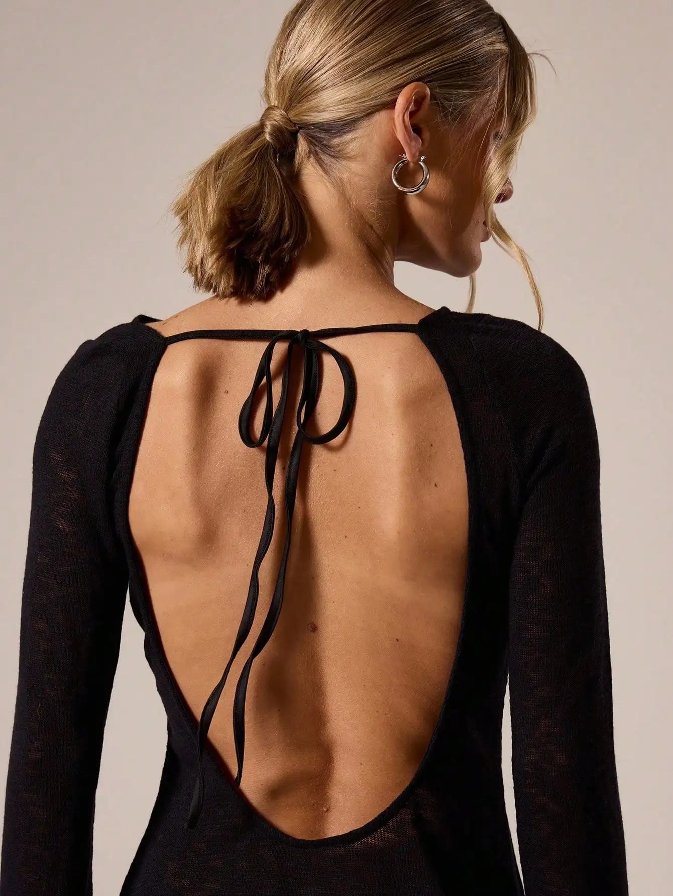 A Line Knit Mini Dress With Slash Neck And Bell Sleeves