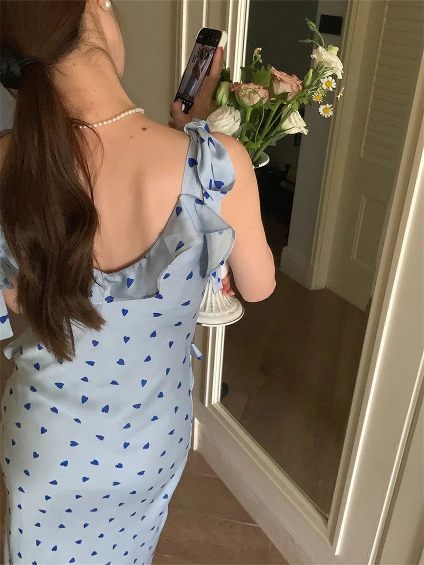 Allover Printed Dress With V Neckline Ruffles And Sleeveless Silhouette