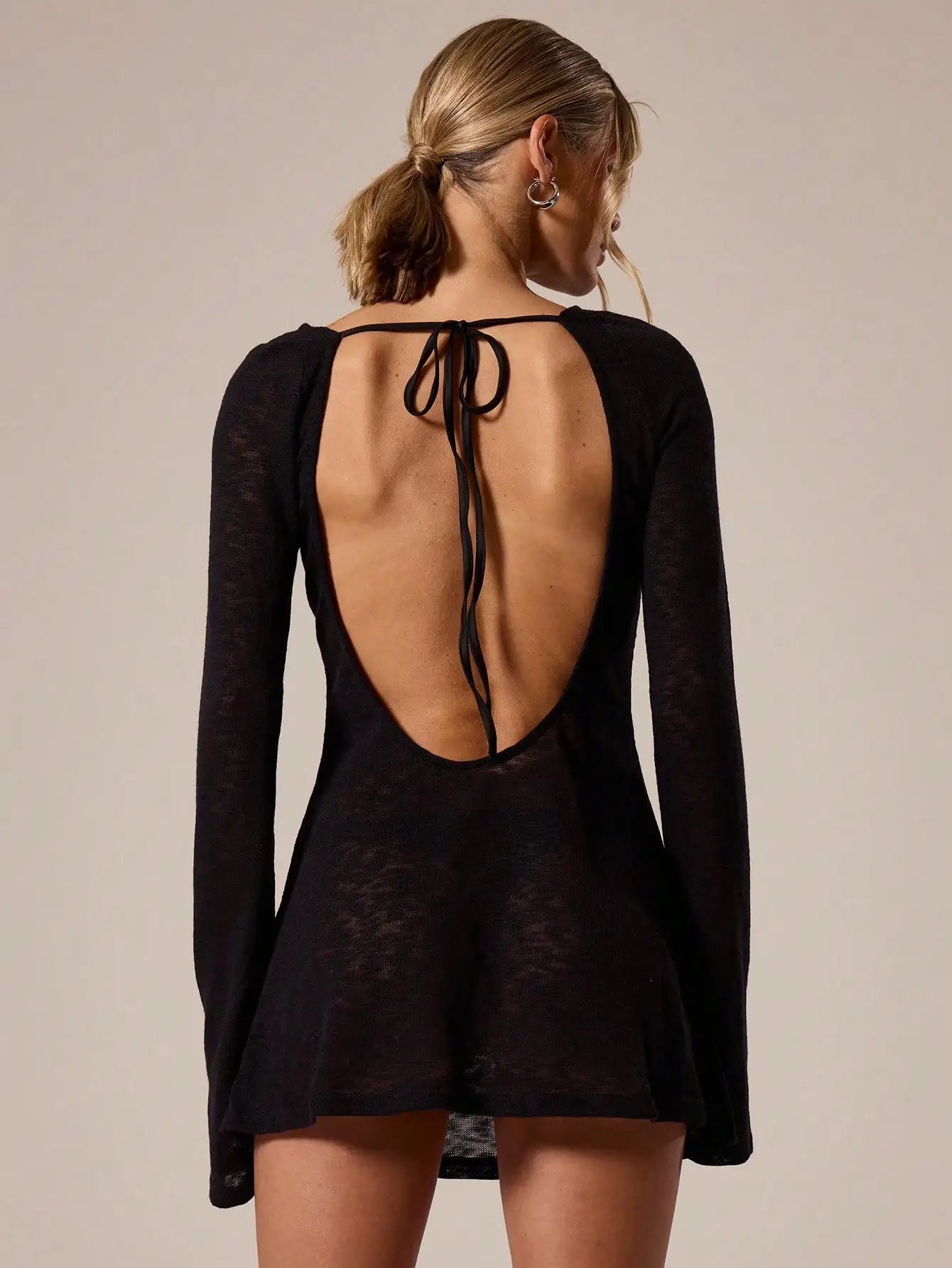 A Line Knit Mini Dress With Slash Neck And Bell Sleeves