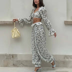 Breezy Ruffle Set With Lightweight Top And Flowing Trousers Casual Style