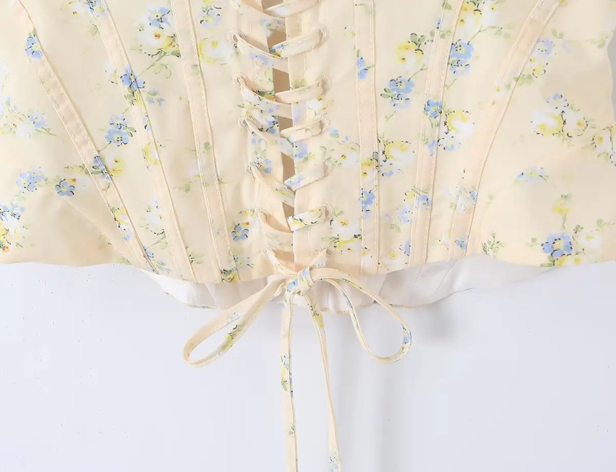 Sunlit Yellow Floral Corset Top With Lace Trim And Delicate Spaghetti Straps