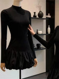 Black Long Sleeve Dress With High Collar And Puffy Silhouette