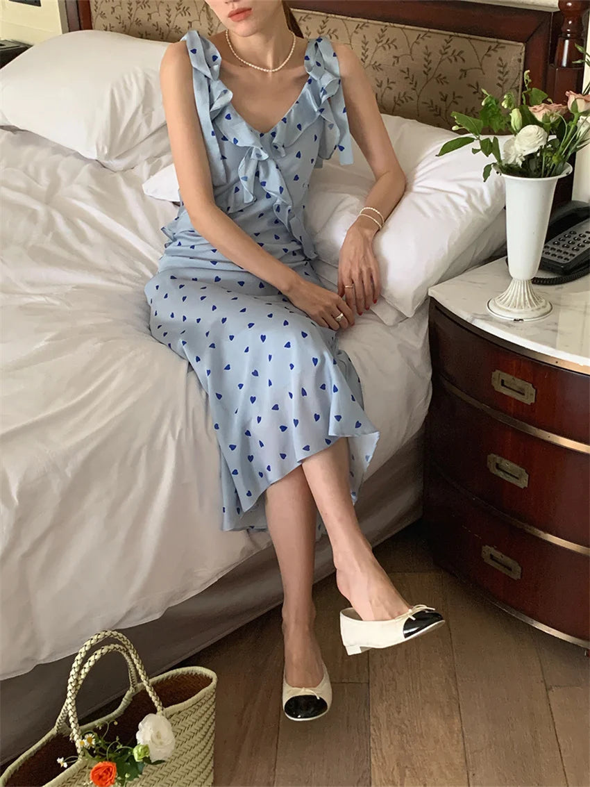 Allover Printed Dress With V Neckline Ruffles And Sleeveless Silhouette