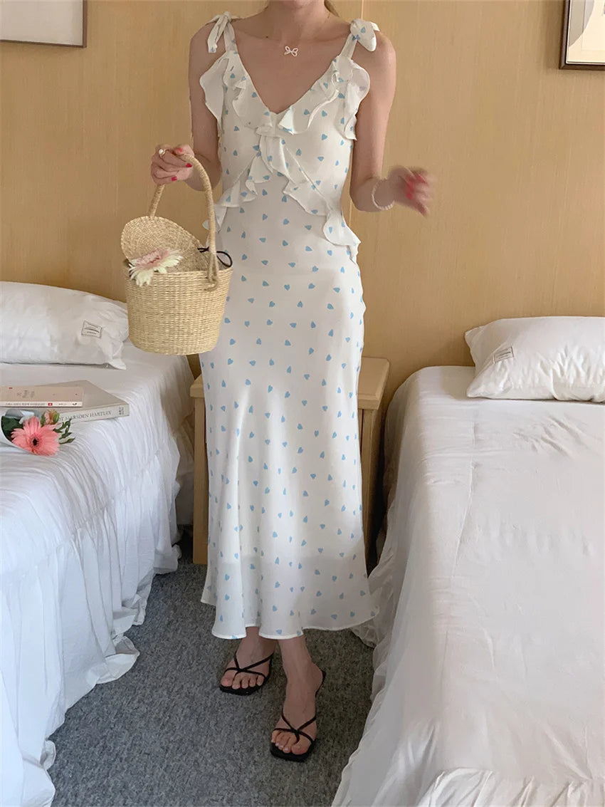 Allover Printed Dress With V Neckline Ruffles And Sleeveless Silhouette