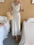 Allover Printed Dress With V Neckline Ruffles And Sleeveless Silhouette