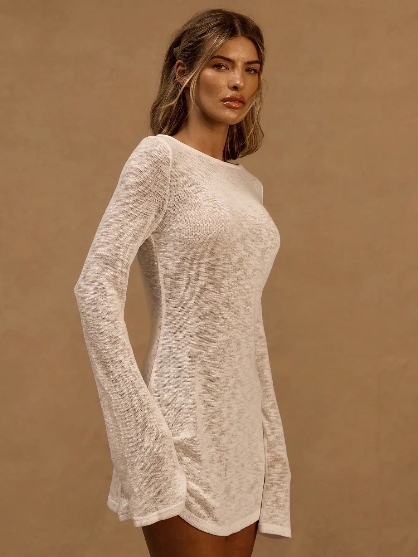 A Line Knit Mini Dress With Slash Neck And Bell Sleeves