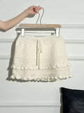 Patchwork Knit Mini Skirt With High Waist Ruffle And Hollow Out Details