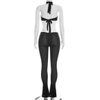 Mesh Backless Halter Jumpsuit With See Through Panels And Figure Hugging Fit