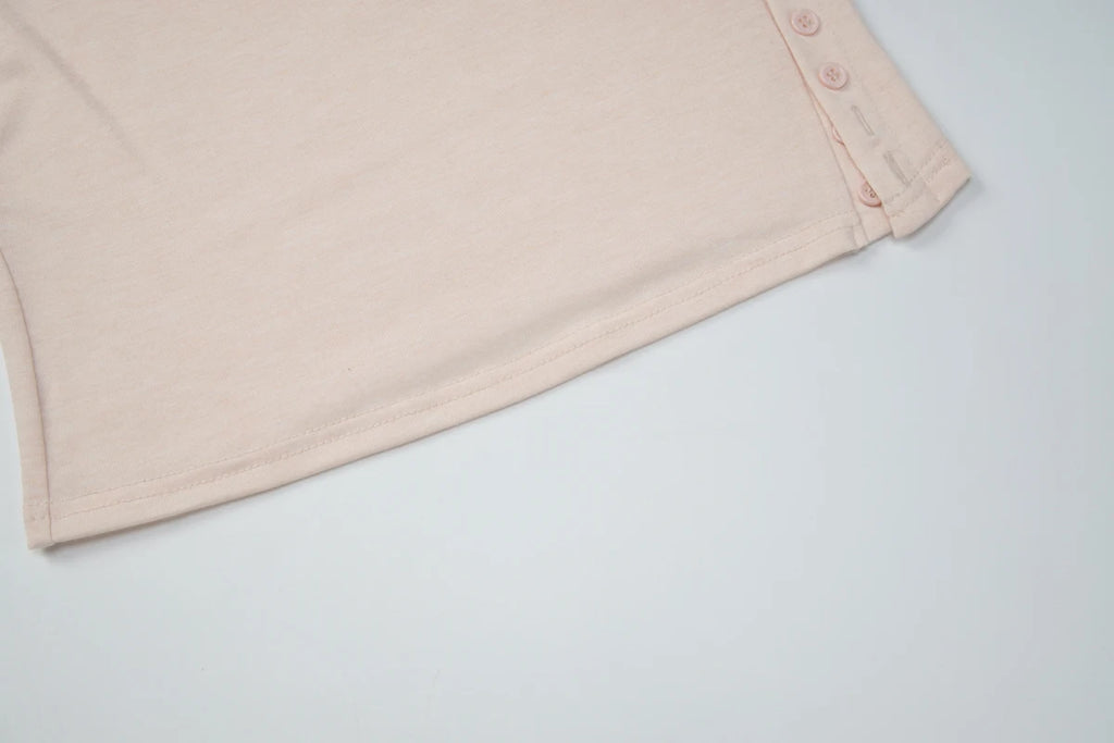 Turtleneck Crop Tank With Slit And Button Details