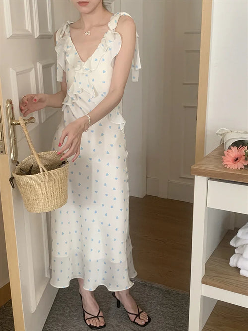 Allover Printed Dress With V Neckline Ruffles And Sleeveless Silhouette