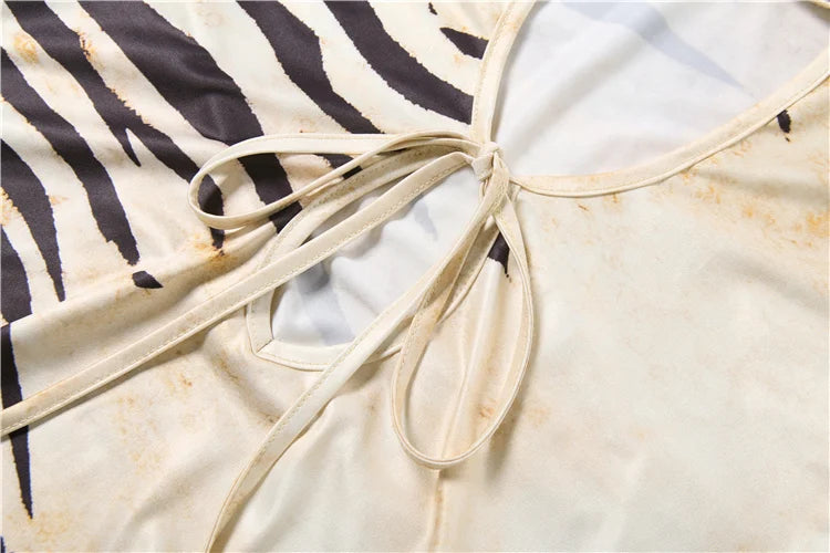 Tiger Print Top With Standing Collar And Tassel Details